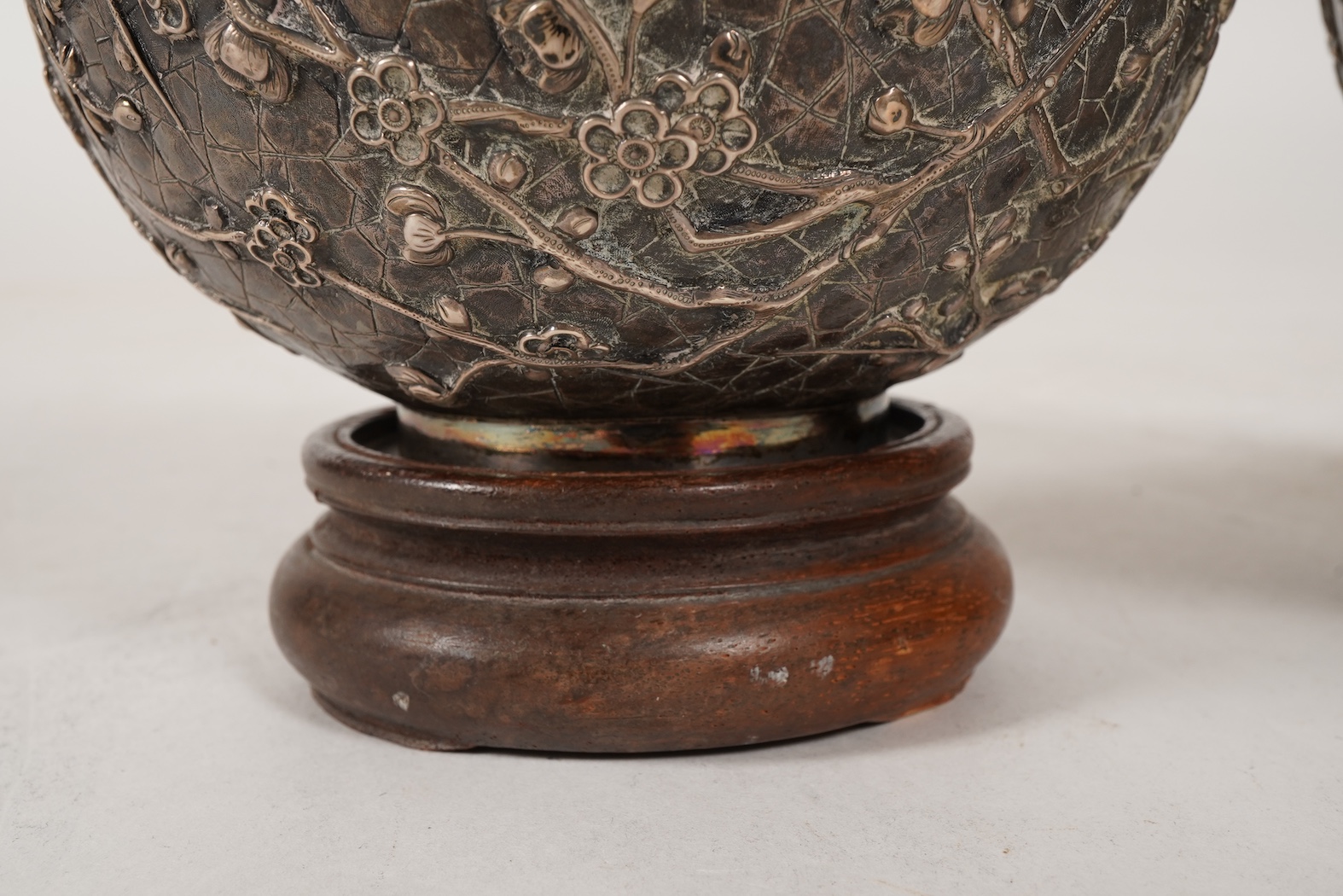 A pair of late 19th/early 20th century Chinese Export white metal two handled globular vases, by Wang Hing, Hong Kong